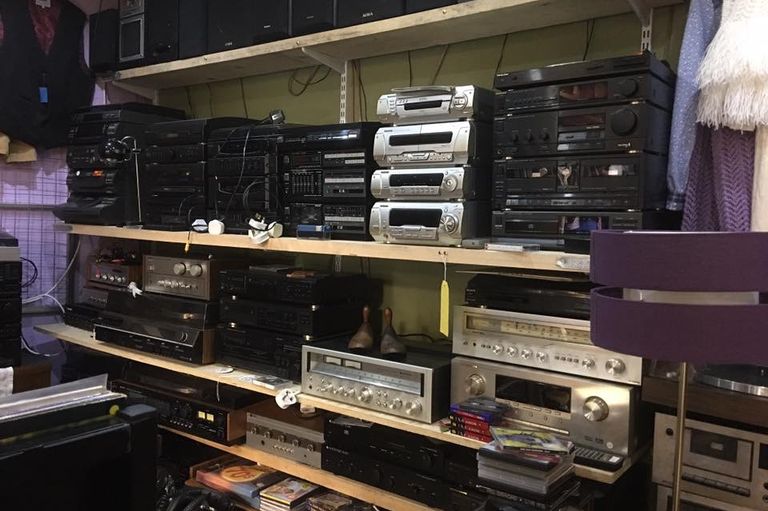 Three shelves of vintage HiFi stereo separates at Plymouth Vintage Vinyl
