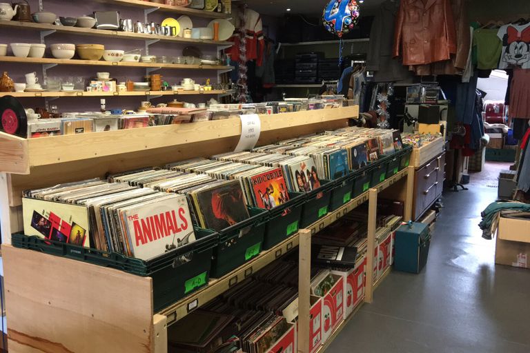Plymouth Vintage Vinyl interior showing record crates, vintage clothing rail and glassware shelves